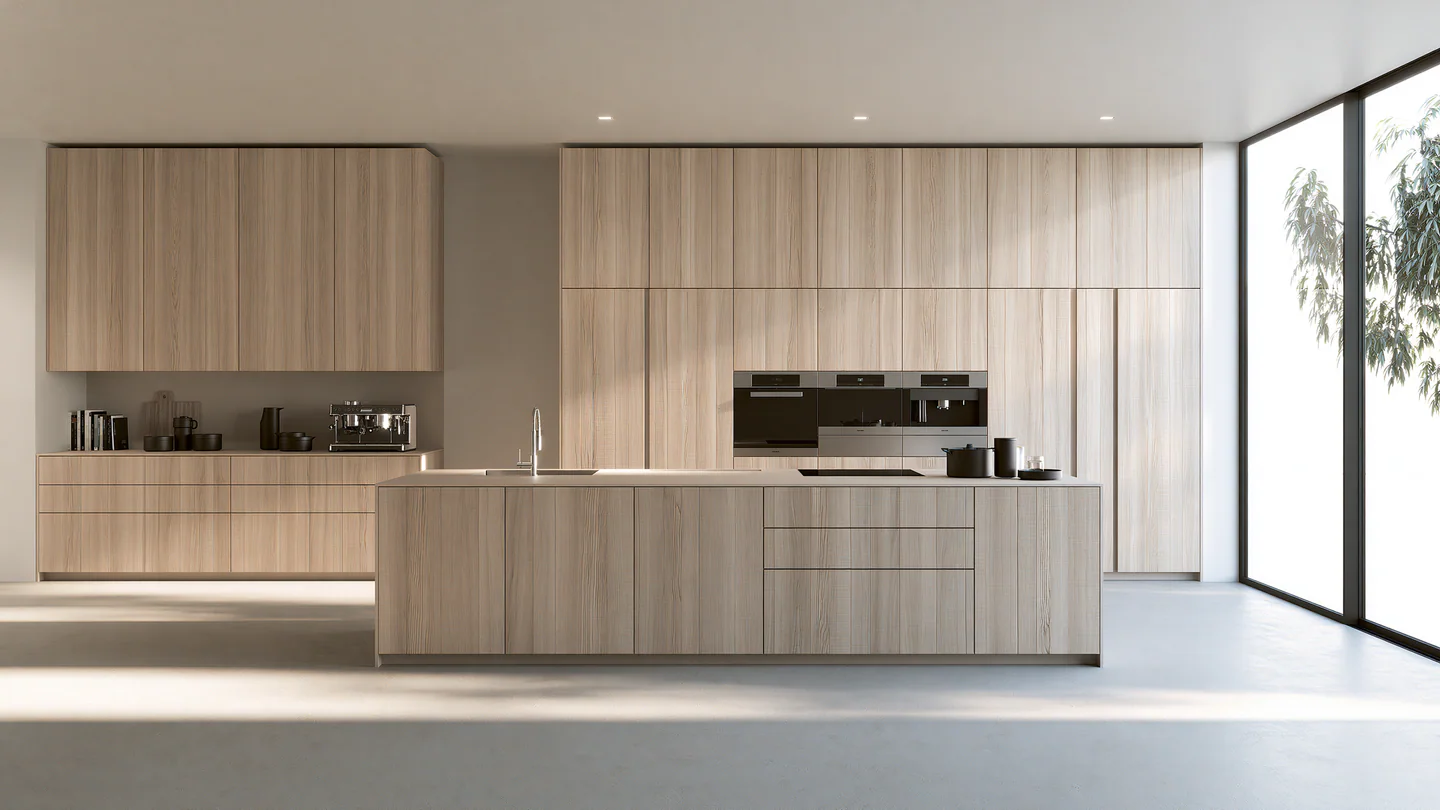 A pale linear wood kitchen, shown as a wide room view